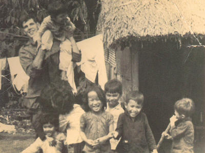 Brian in Vietnam playing with children